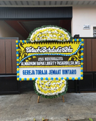 Papan Bunga Duka di Medang Kampai